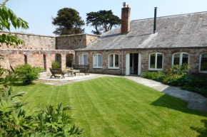 The Coach House within heritage Tregrehan Garden on Cornwall's South Coast